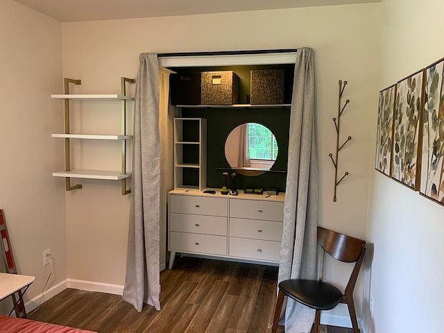 Bedroom features lots of closet space and storage, and a comfy Danish teak full-size bed with memory foam mattress. 