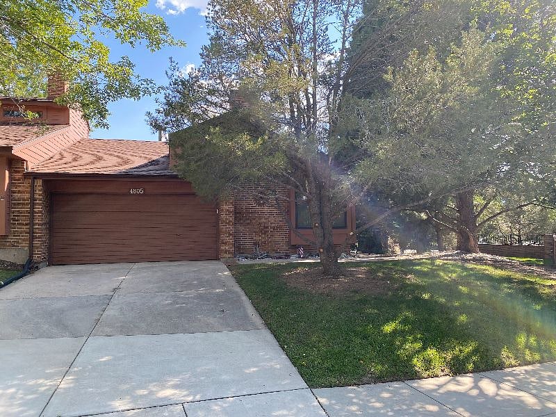 Looking South at Driveway and Two Car Garage with Keyless Entry and Automatic Door.