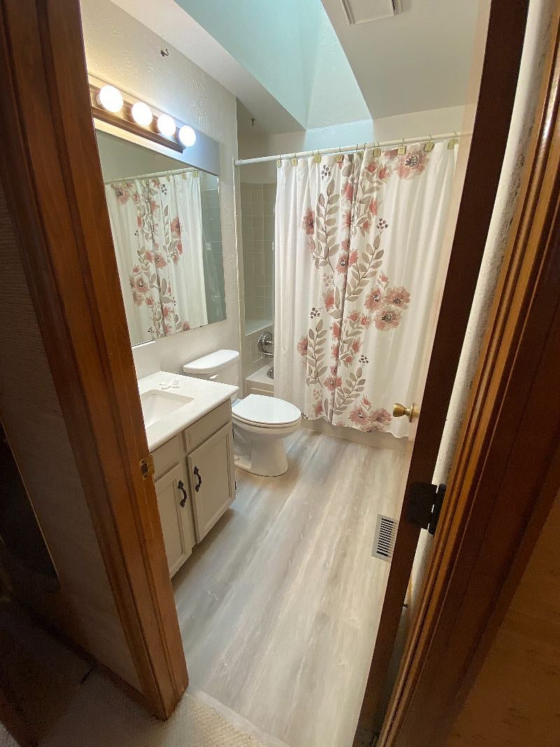 Master Bathroom New Vinyl Flooring.