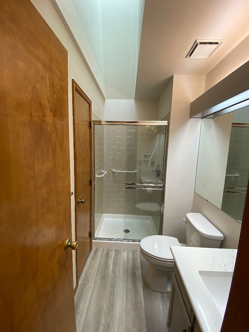 Hall Bathroom.  New Vinyl Flooring