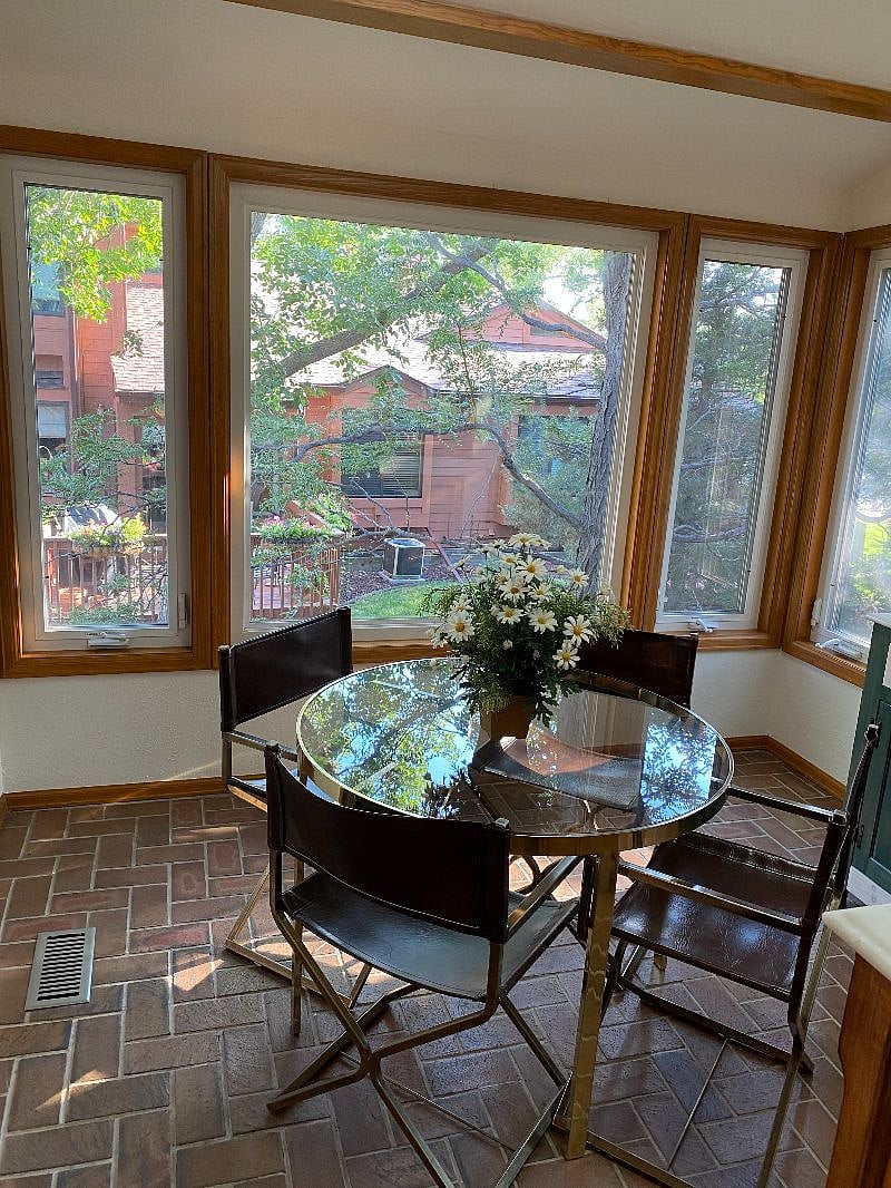 Sunroom looking South out windows.  Vaulted Ceiling with Sky light.