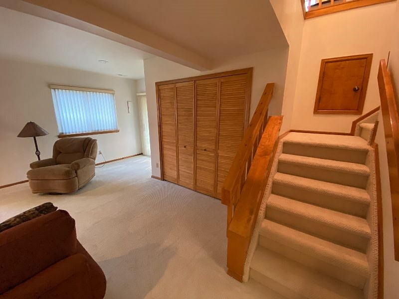 Finished Basement , Stairs going up to Living Room.