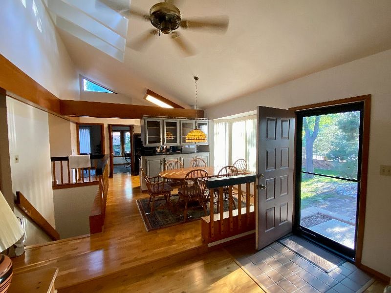 Entry into the Living Room.  Looking south at the Dinning Room and Kitchen
