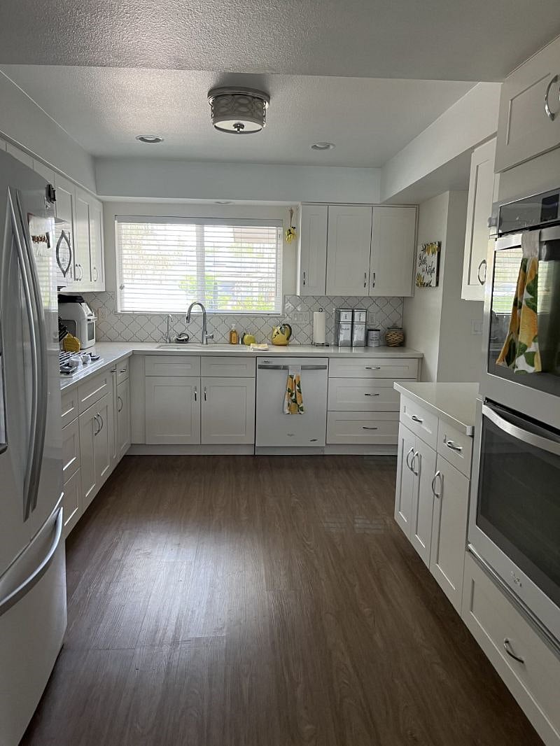 Full kitchen just steps away from suite. 