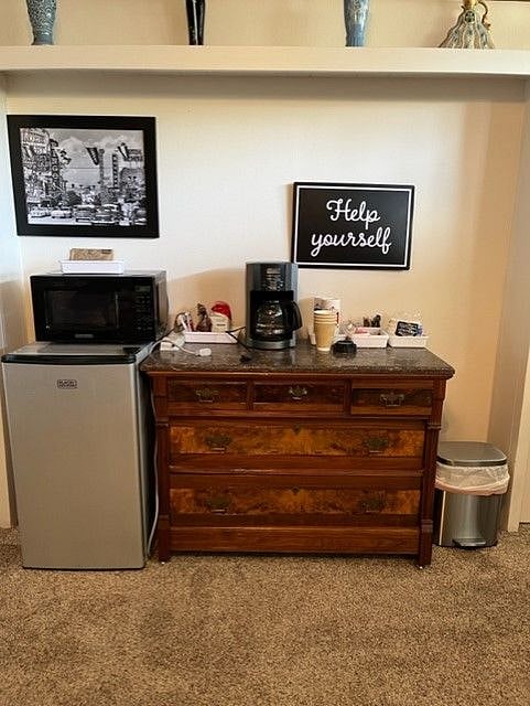 Microwave, mini fridge with freezer and coffee maker. Coffee and tea bar. 