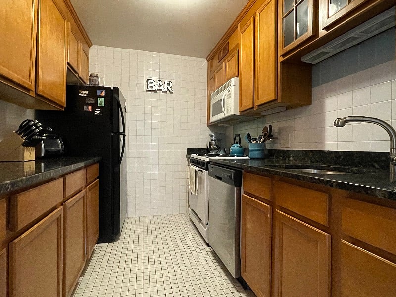 Fully functional kitchen with a full size fridge and plenty of cabinet space. All matching objects: Villroy and Boch dish ware, CuisineArt flatware, pots and pans set and appliances. Enjoy the use of quality kitchenware to create a tasteful table setting.
