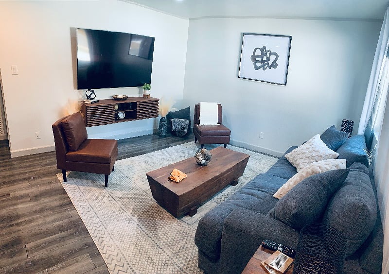 Living Room with new furnishings and 70" smart tv