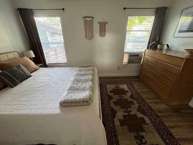 Two south-facing windows in master room.