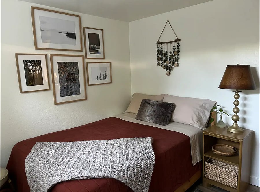 Full-size bed with foam topper.