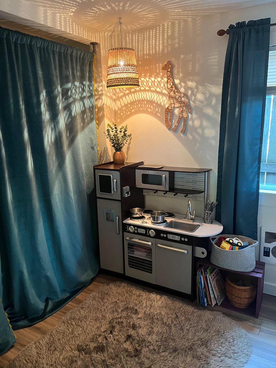 Play kitchen can be removed if tenant desires.