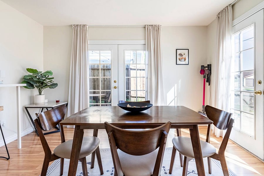 Dining area showing the french doors which lead to the side yard as shown in the next slide (View 2 of 2)