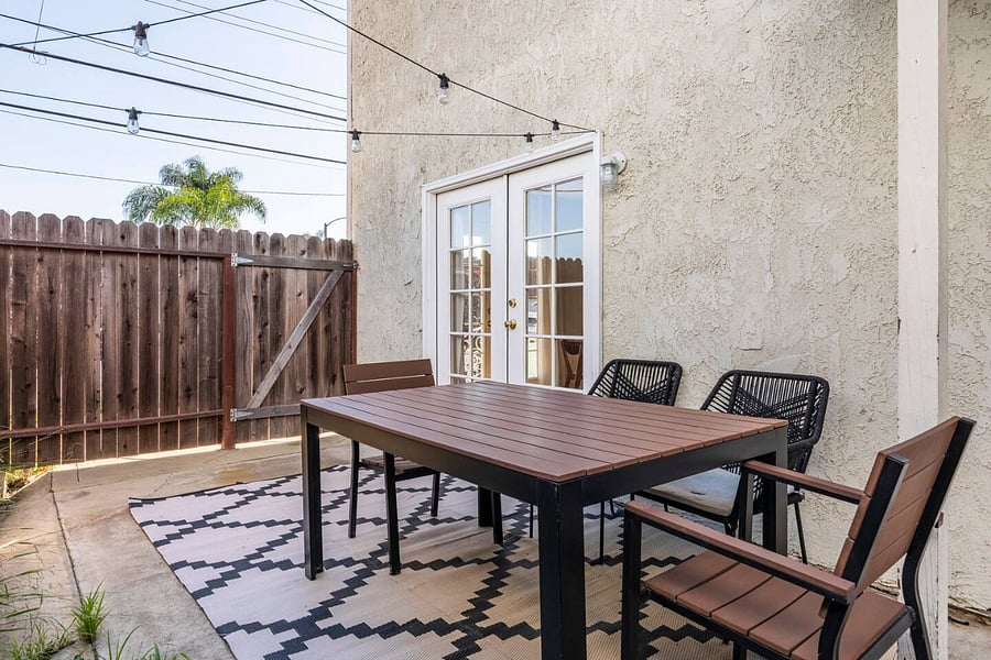 Fenced Outdoor Patio with Solar Powered String Lights (View 1 of 1)