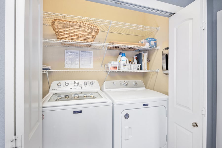Separate Laundry closet off of hallway to Primary bedroom, with new Maytag Washer & Dryer