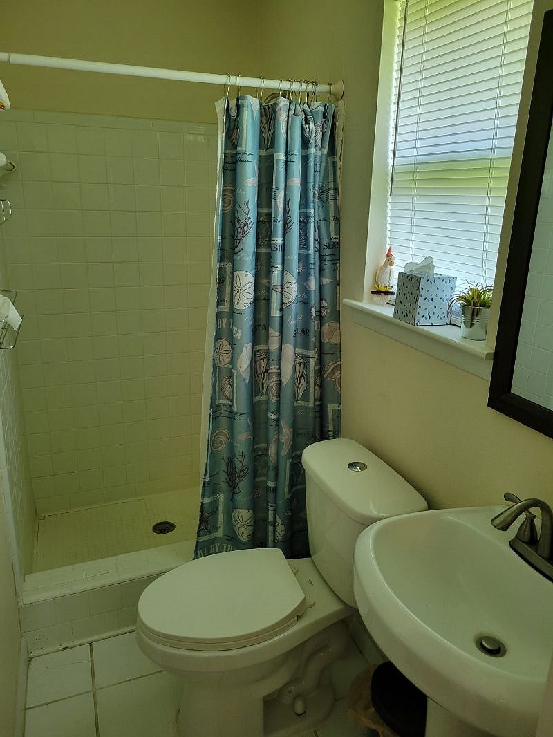 small bathroom with shower.