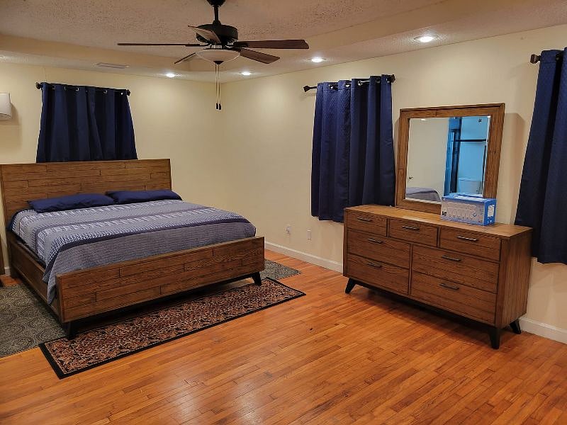 king bedroom, really large room! Comfy bed. Blackout window shades.