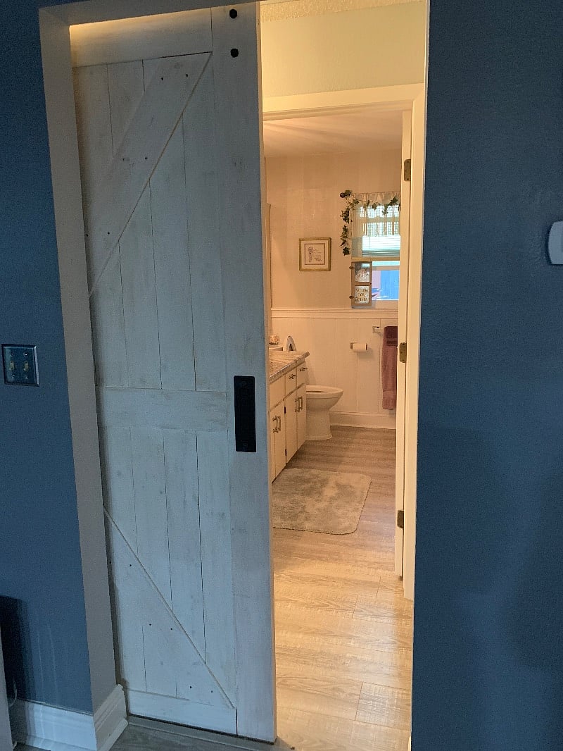 Barn door for privacy to living area