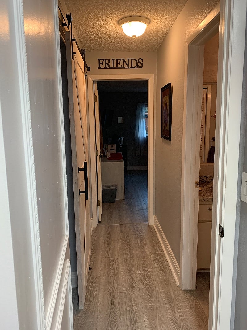 Hallway from laundry to bathroom to bedroom