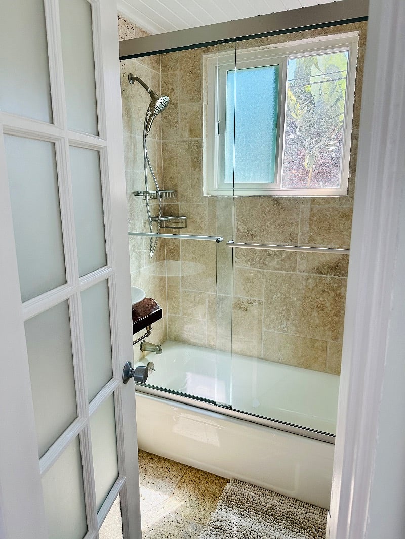 Full size shower/tub combo.