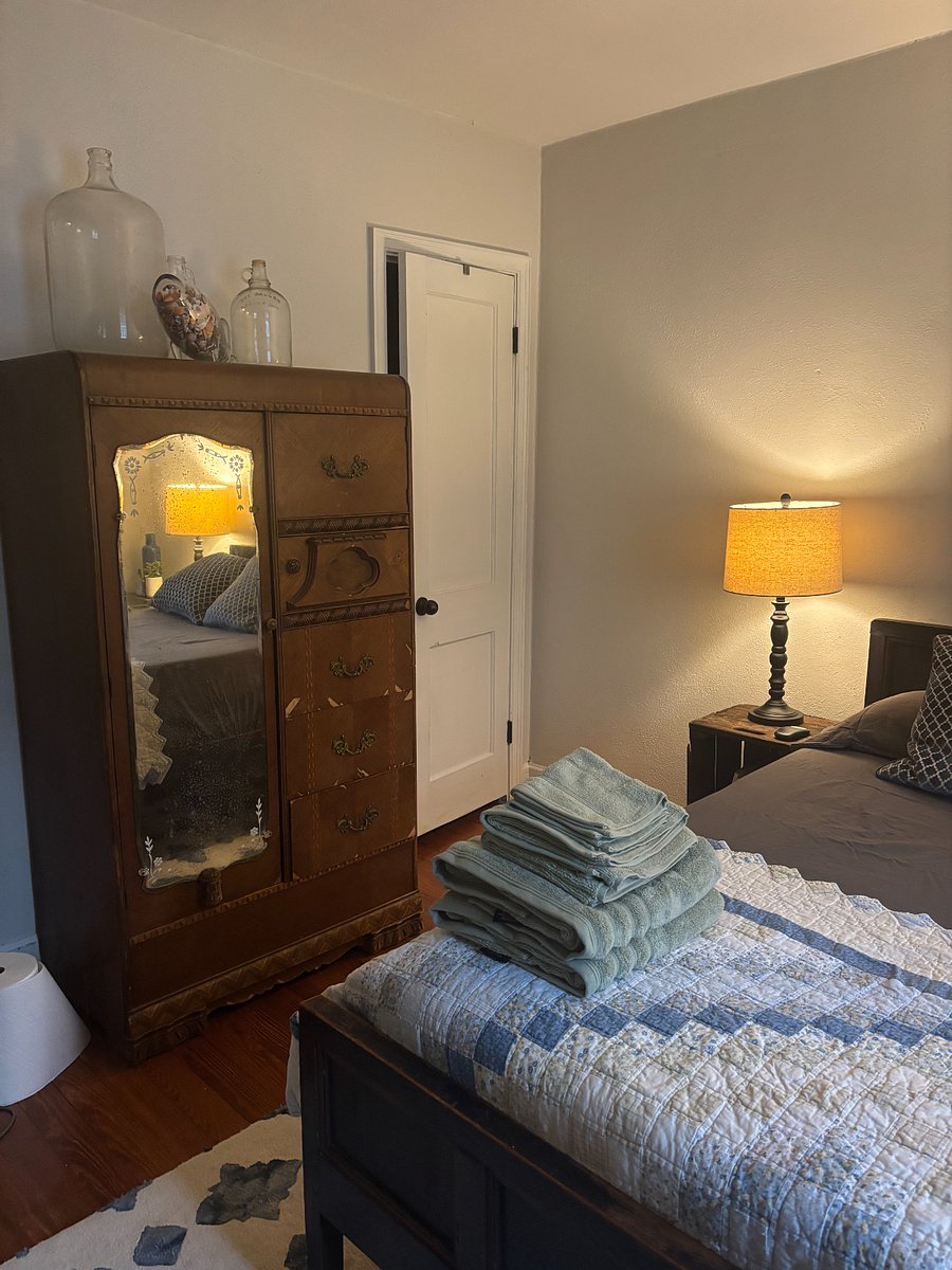 Unit 1/$800 - full-size bed, closet and dresser, dedicated workspace, lounge chair 