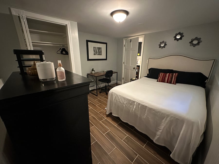 Separate Spacious bedroom with study desk, queen size bed, full size closet and a large 5 drawers chest 