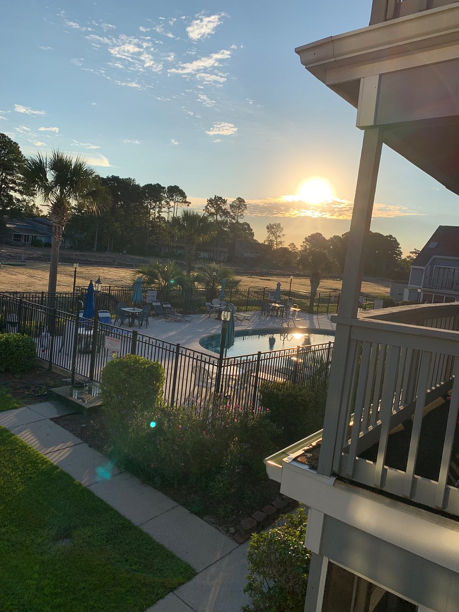 Sunrise over the pool hot tub and pool