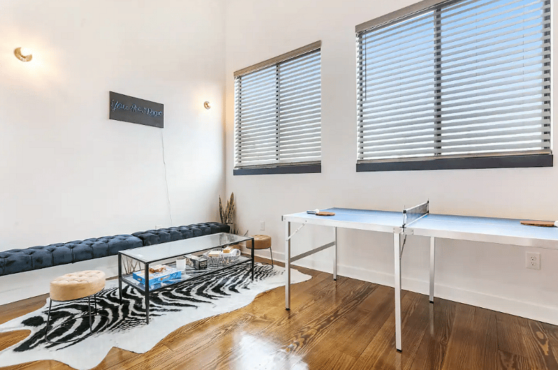 Loft Game area. Enough games for some fun! Connect 4 , Uno , dominoes, The game of things, Jenga ,5 Second Rule Uncensored game, and Ping pong table.