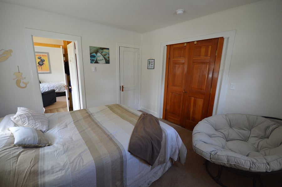 Queen bed in front room