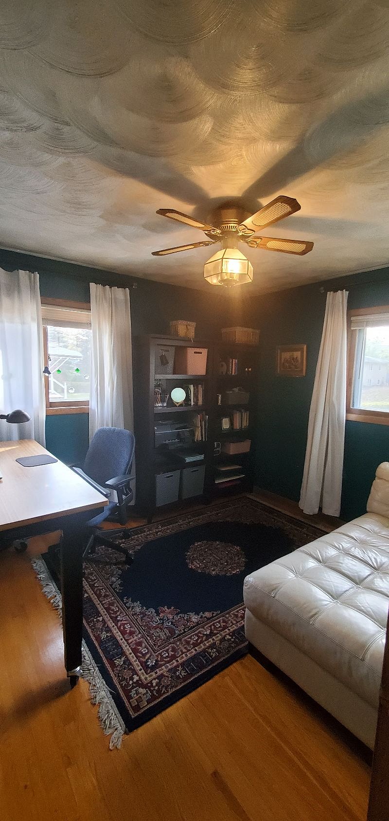 3rd bedroom set up as private office with sit-stand desk and 