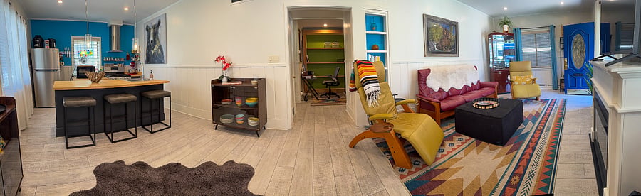 Sunny, spacious living room and open concept kitchen