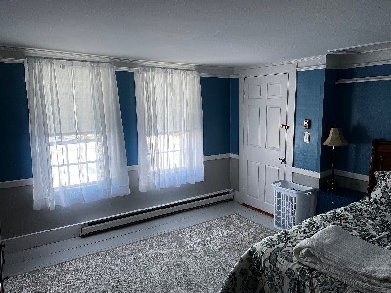 The bedroom is located in the middle of the house on the second floor.