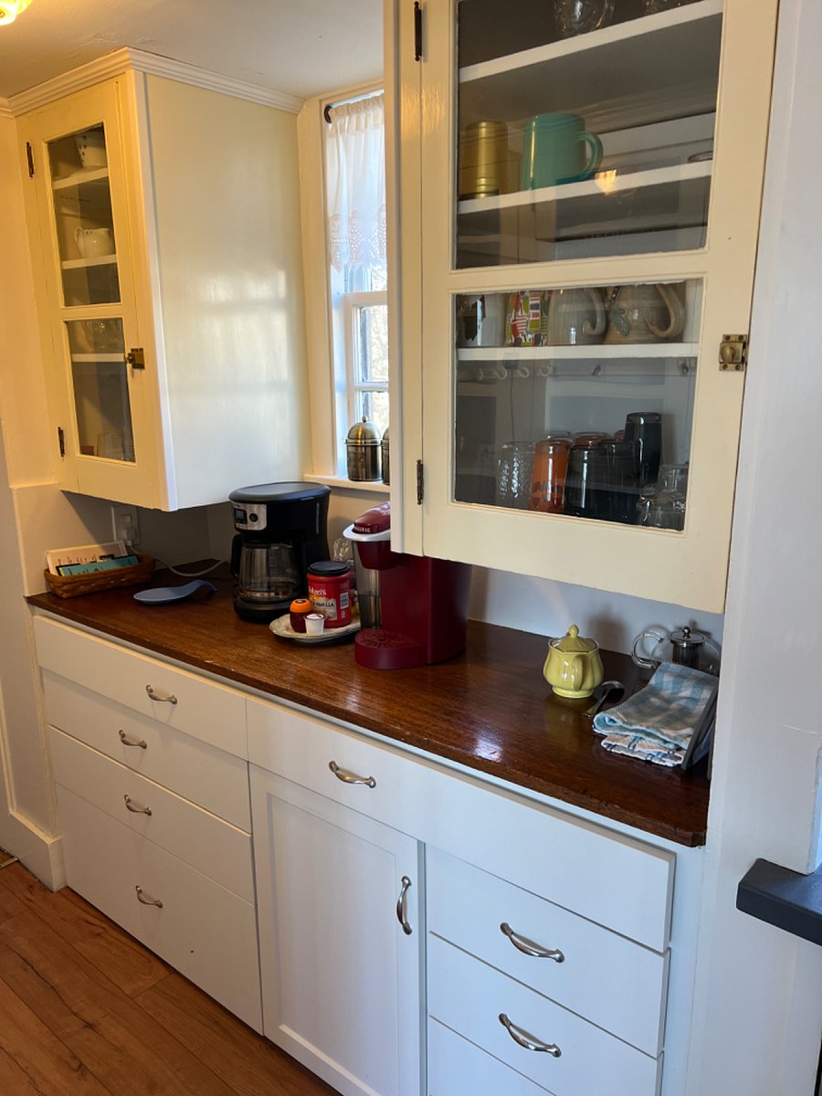 The butler's pantry is equipped with a coffee station