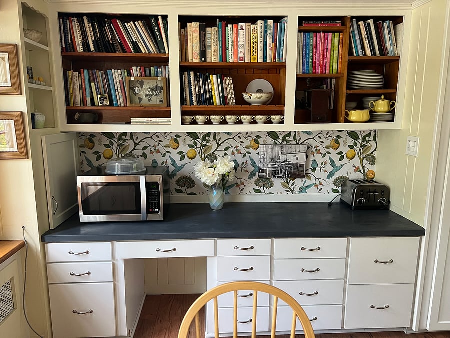 We have a large microwave, toaster, and over 200 cookbooks for those who like to cook!