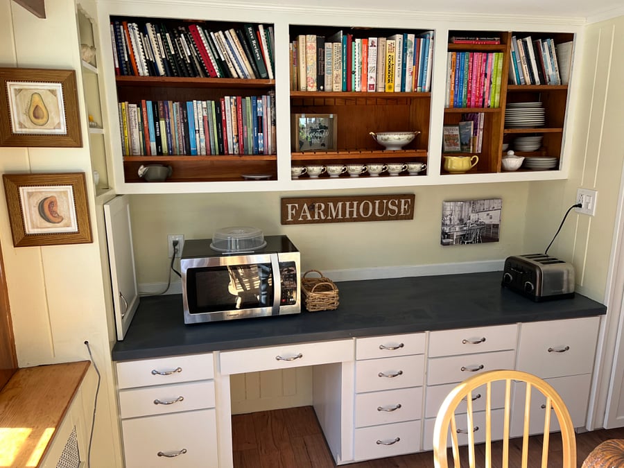 We have a large microwave, toaster, and over 200 cookbooks for those who like to cook!