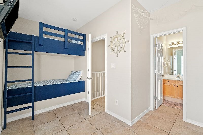 3rd floor bunkroom with attached bathroom. 4 twin beds (other 2 are on the opposite wall)