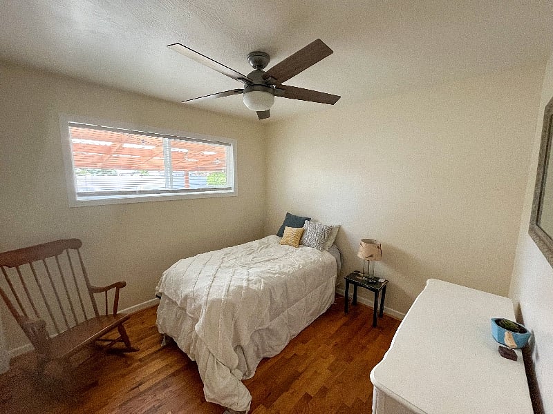 Second bedroom with twin bed and closet