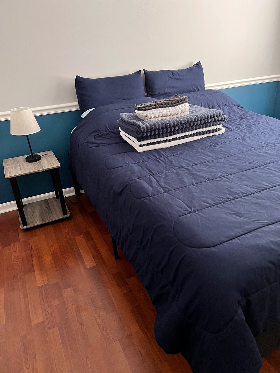 queen bed in front room
