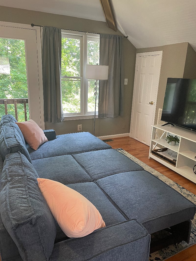 Couch can fold out to be a second bed for weekend guests.