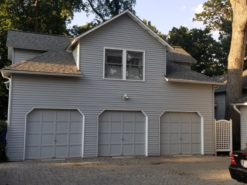 Double window is the apartment and the garage bay to the far left is included.