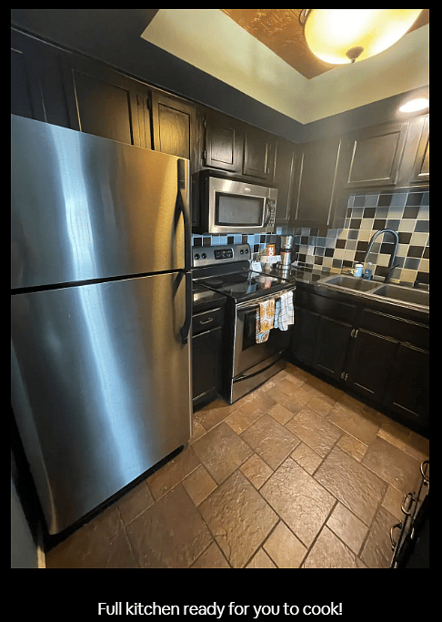 Kitchen is equipped with full-size appliances and stocked with everything you need to cook a meal. 