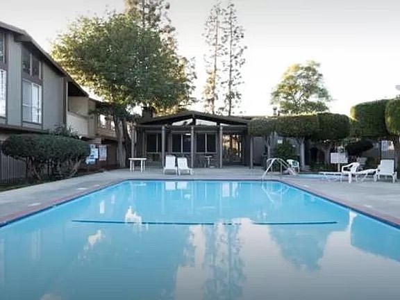 Two large pools on premises, one jacuzzi, and children's play area.