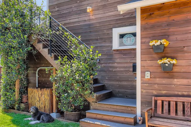Private stairs and friendly dog.