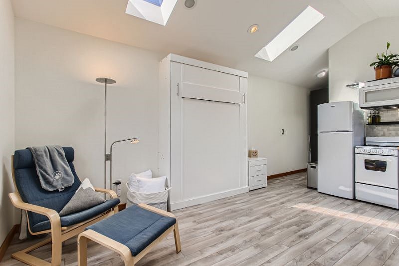 Main living/sleeping area with murphy bed up.