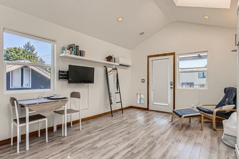 Main living/sleeping area with murphy bed up.
