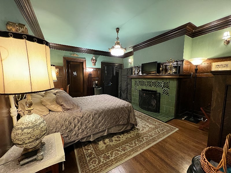 Bedroom with non working fireplace