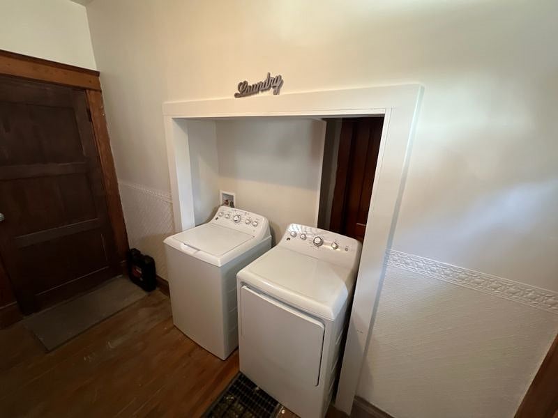 Shared Laundry Room
This door goes to the hallway where we have a shared washer and dryer for all three floors.