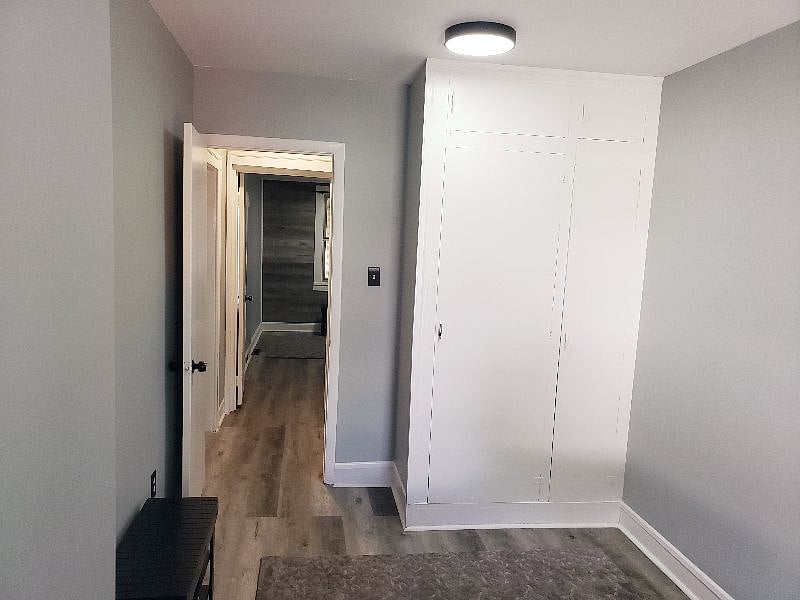 2nd Bedroom with Built in Closets/Cabinets and Sitting Bench