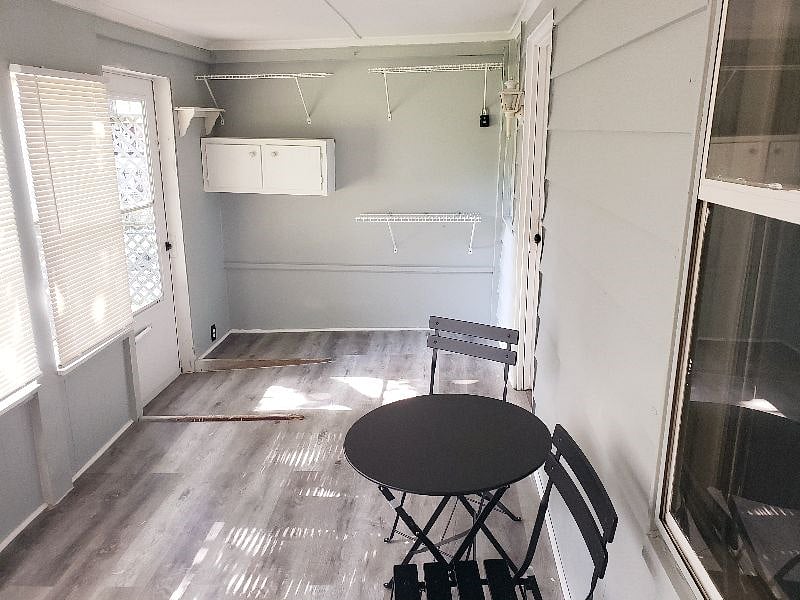Sunroom/Lockbox/Storage Cabinet.
(Slanted Floor is for Disabled Tenants)