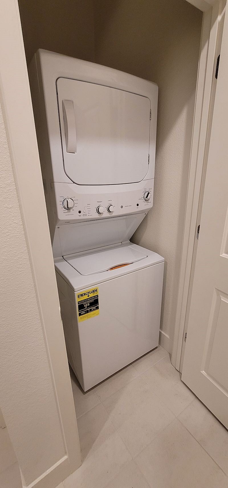 Brand new electric GE washer (3.8 cu) and dryer (5.9 cu) combination set