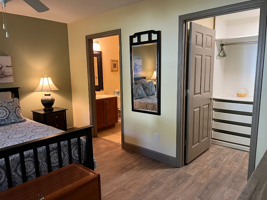Master bedroom view into master bath and walk in closet