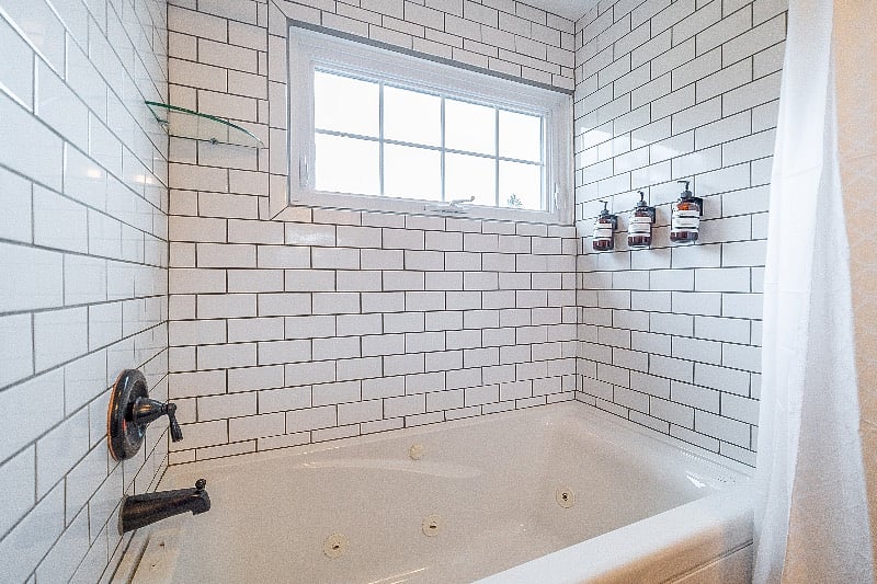 Niche in corner for your own bathing essentials.